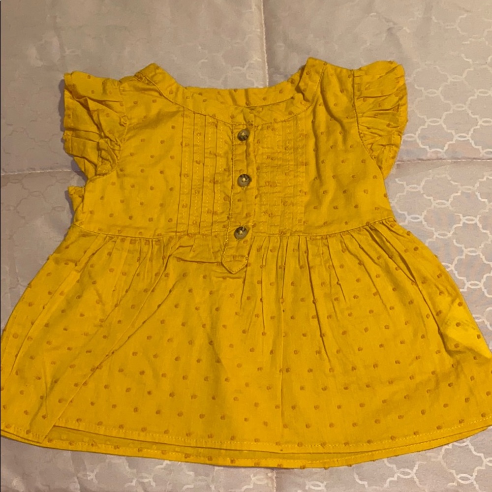Yellow frilly top